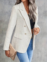 Structured white blazer with a button front, front view