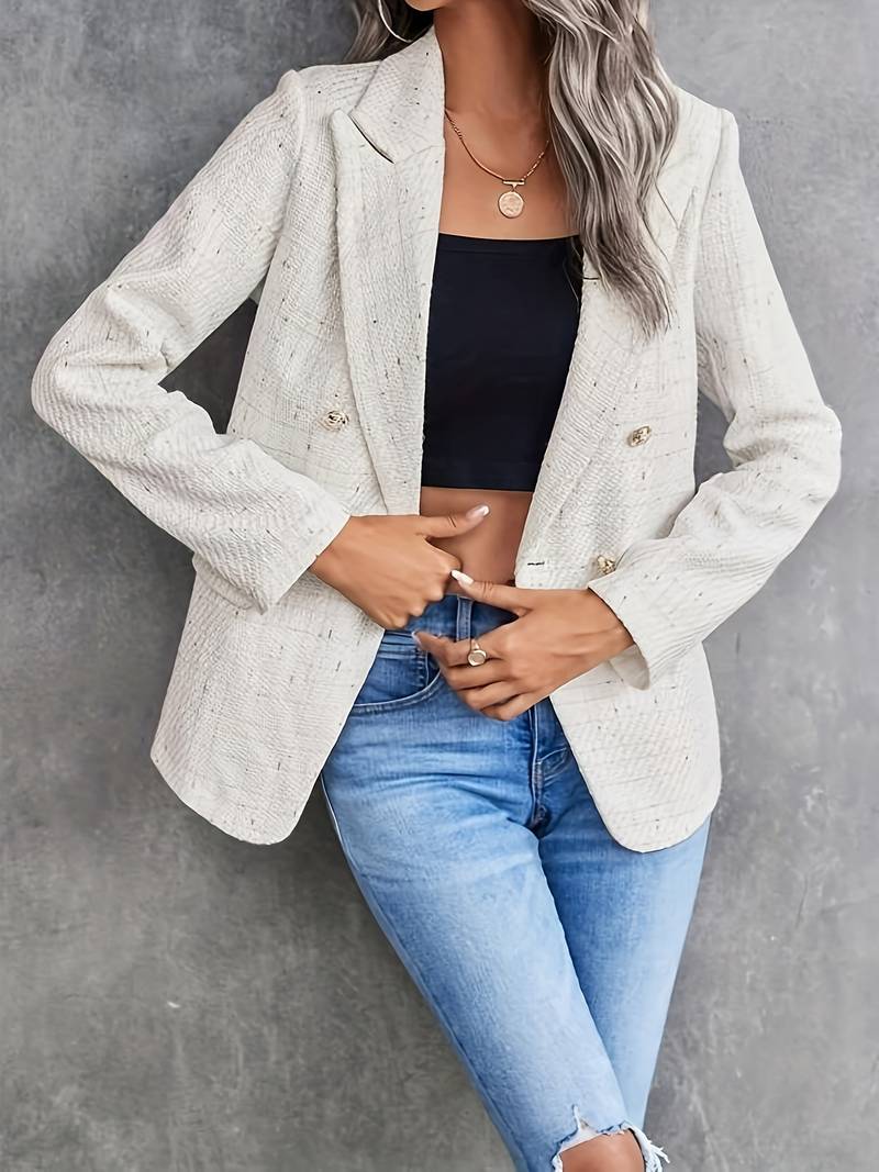 White blazer shown from the side