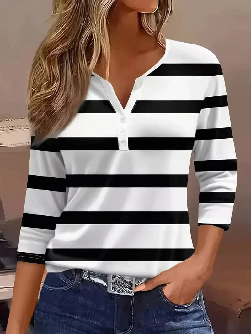 Striped top showing the neckline and button detail