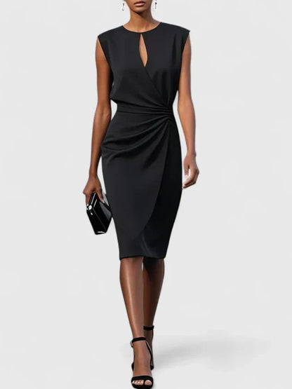 Tailored cocktail dress shown standing