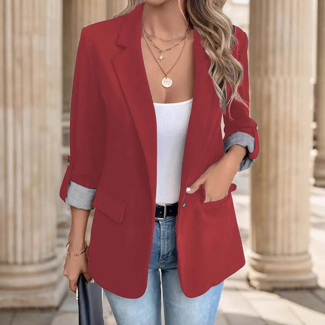 Blazer showing the rolled sleeve and striped cuff