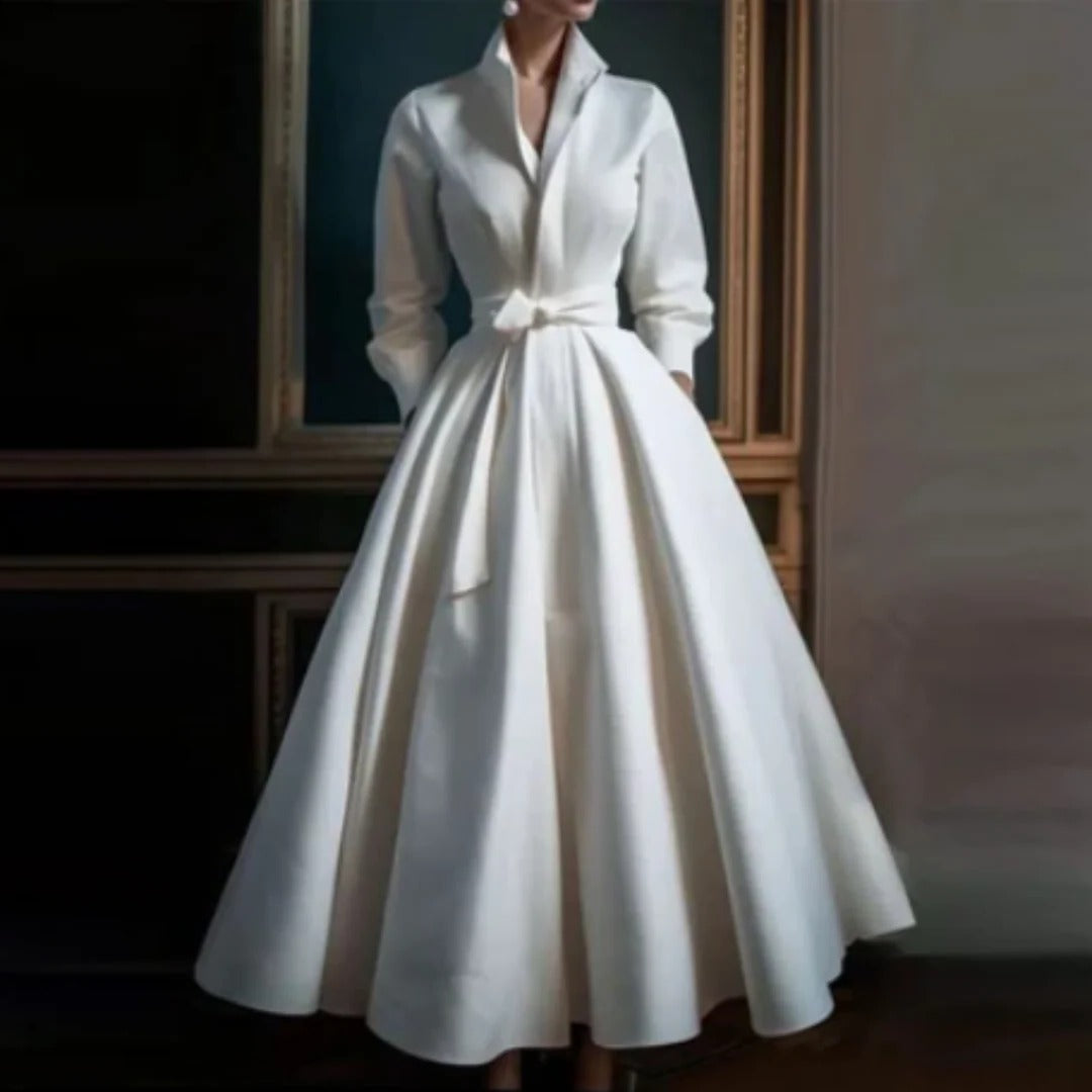 White long-sleeve A-line midi dress with a V-neckline, front view