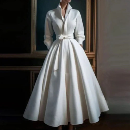 White long-sleeve A-line midi dress with a V-neckline, front view