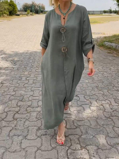 Tailored long-sleeve dress shown from the side