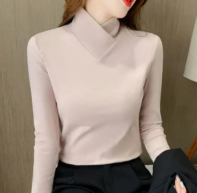 High-neck sweater shown close up
