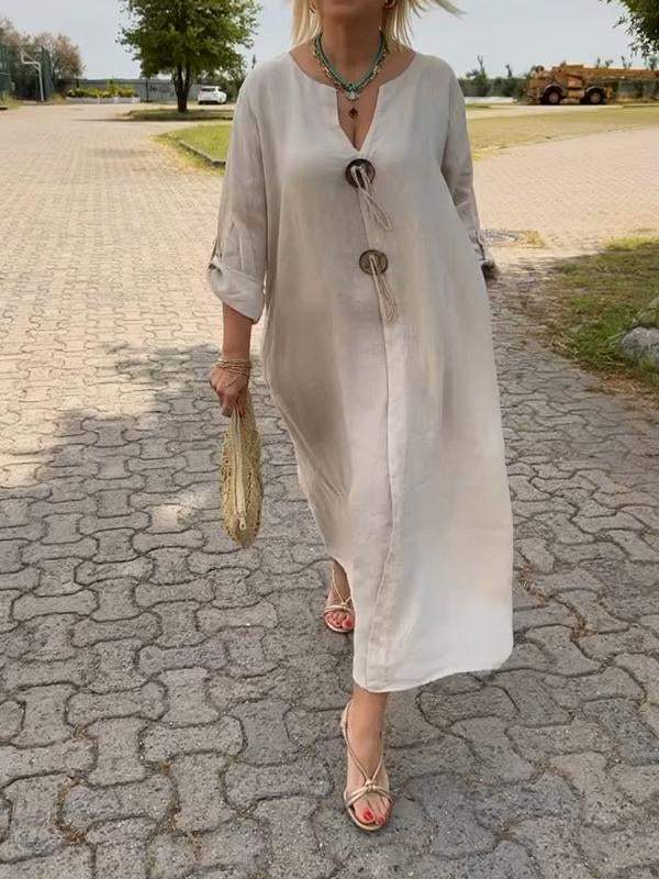 Tailored dress showing the sleeve length