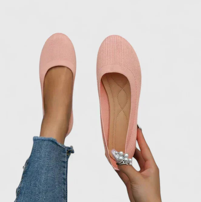 Flat loafers showing the contoured footbed inside the shoe