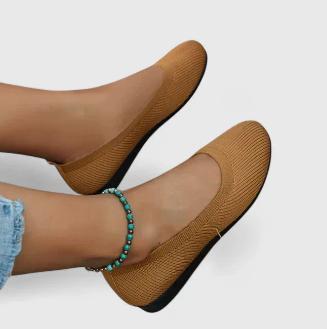 Pair of flat slip-on loafers shown together