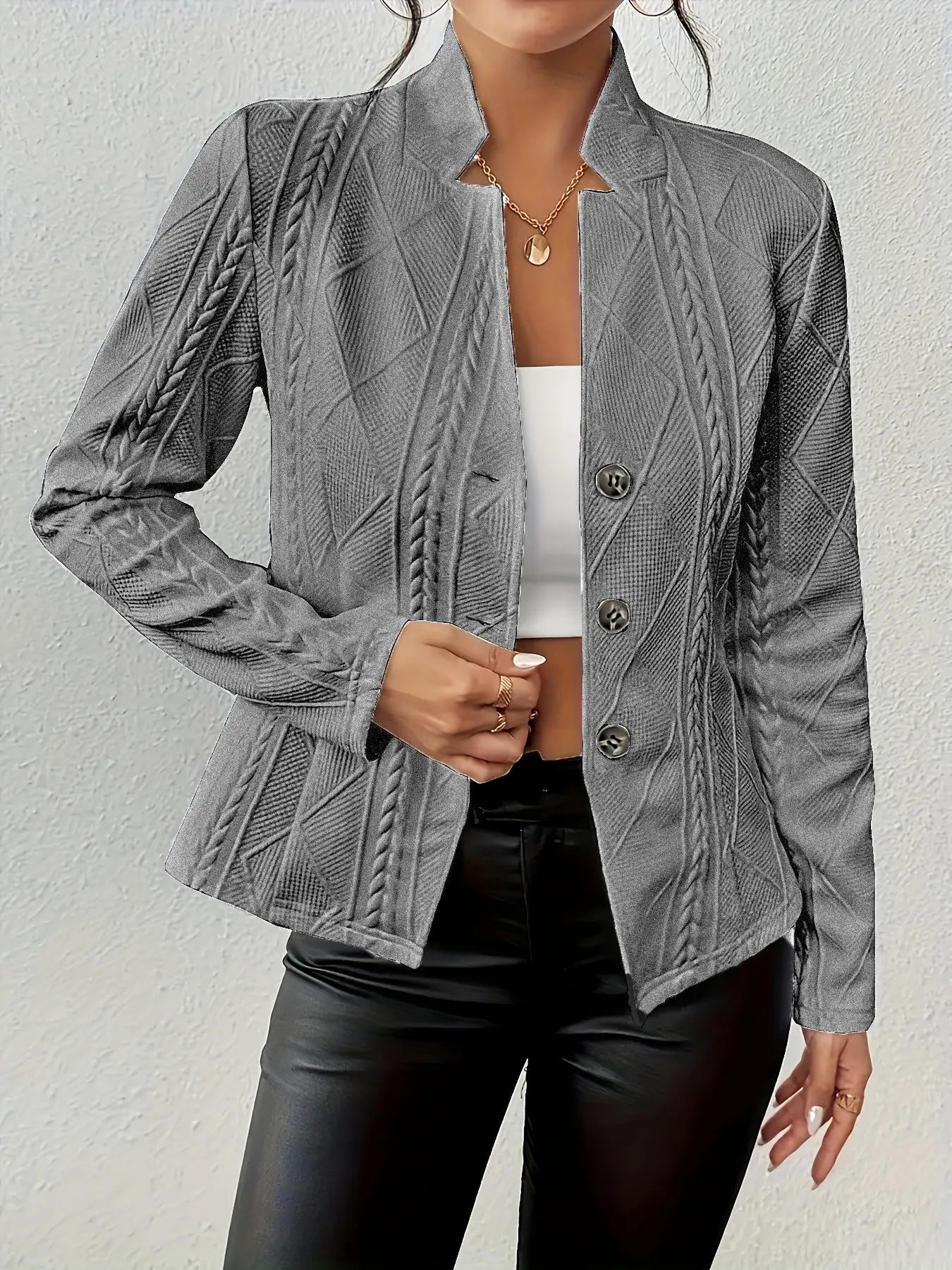 Relaxed blazer showing the front opening and hem
