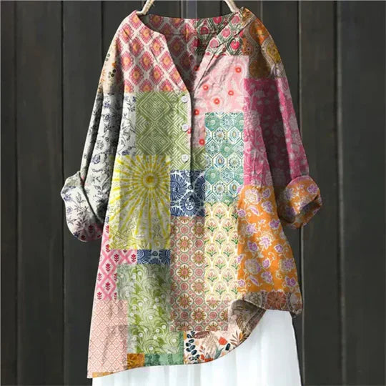 Floral tunic showing the rolled cuff and print