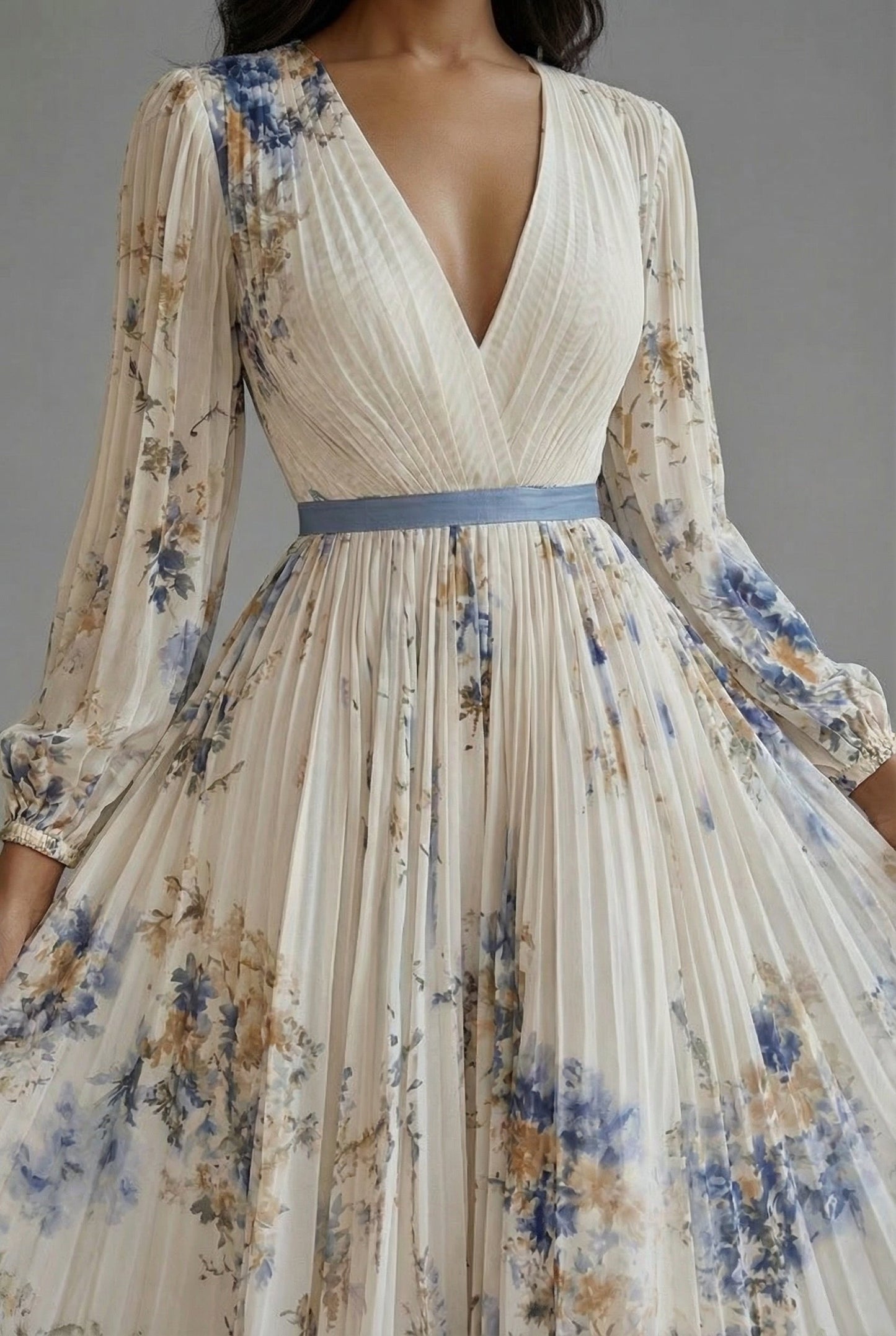 Pleated maxi dress showing the cinched waist