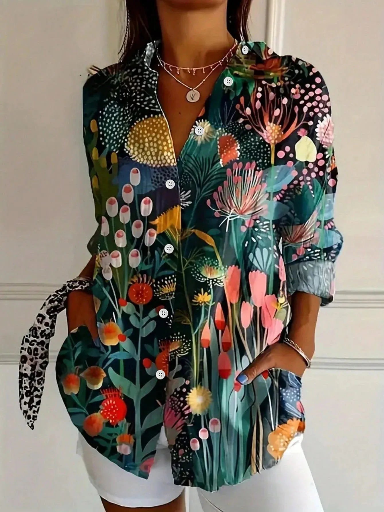 Floral blouse showing the sleeve and print