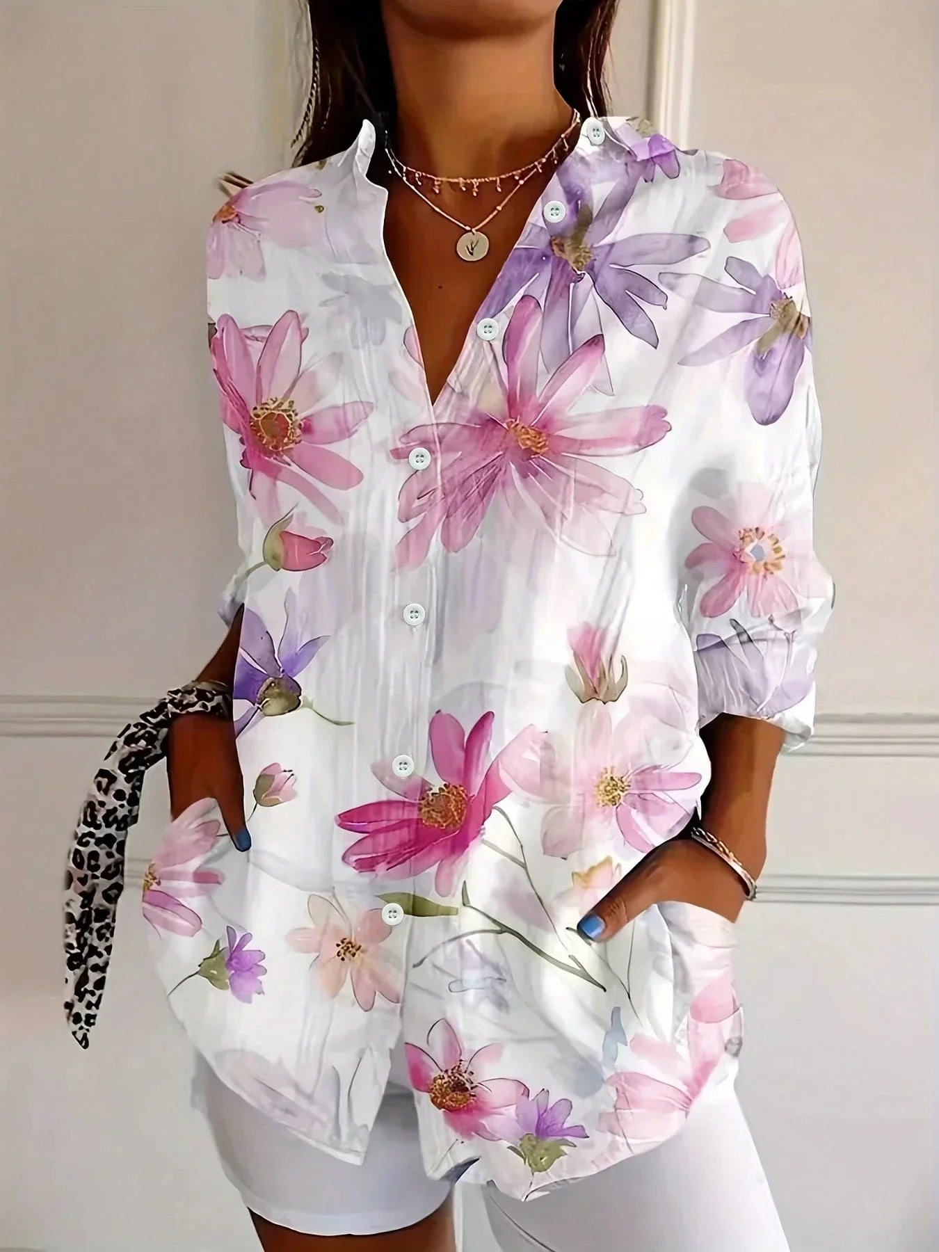 Floral blouse showing the print and button front