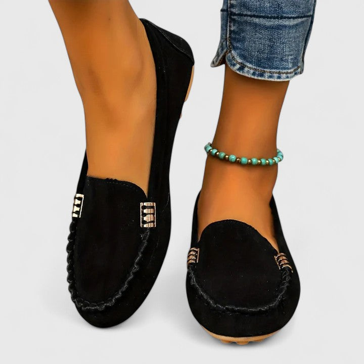 Loafers showing the gold bar and stitched vamp