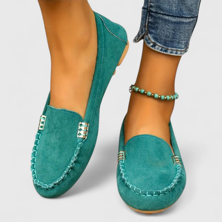 Close view of the moccasin stitching on a loafer