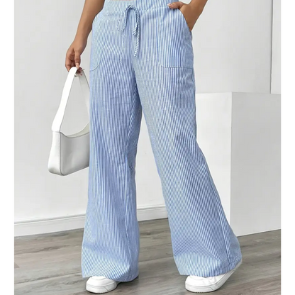 Wide-leg pants showing the drawstring waist and stripe detail