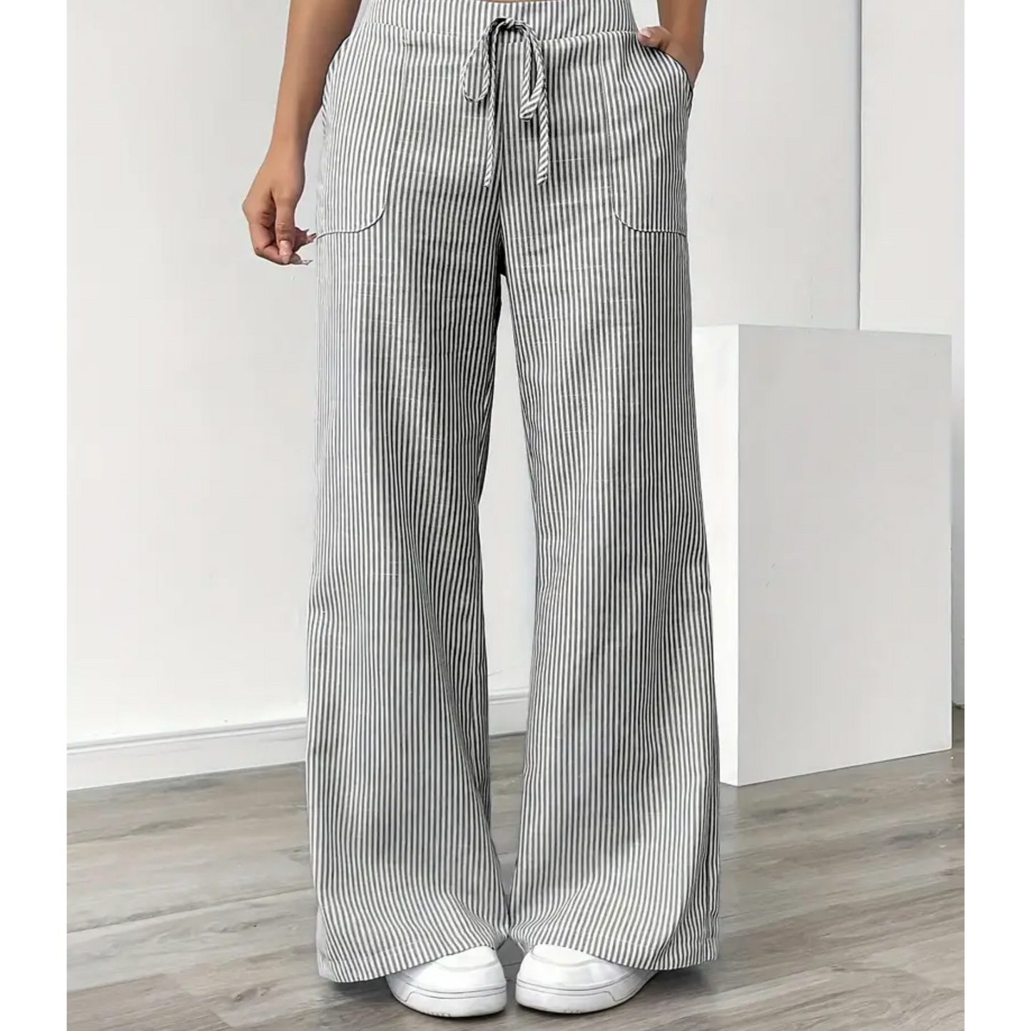 Striped wide-leg pants showing the front pocket