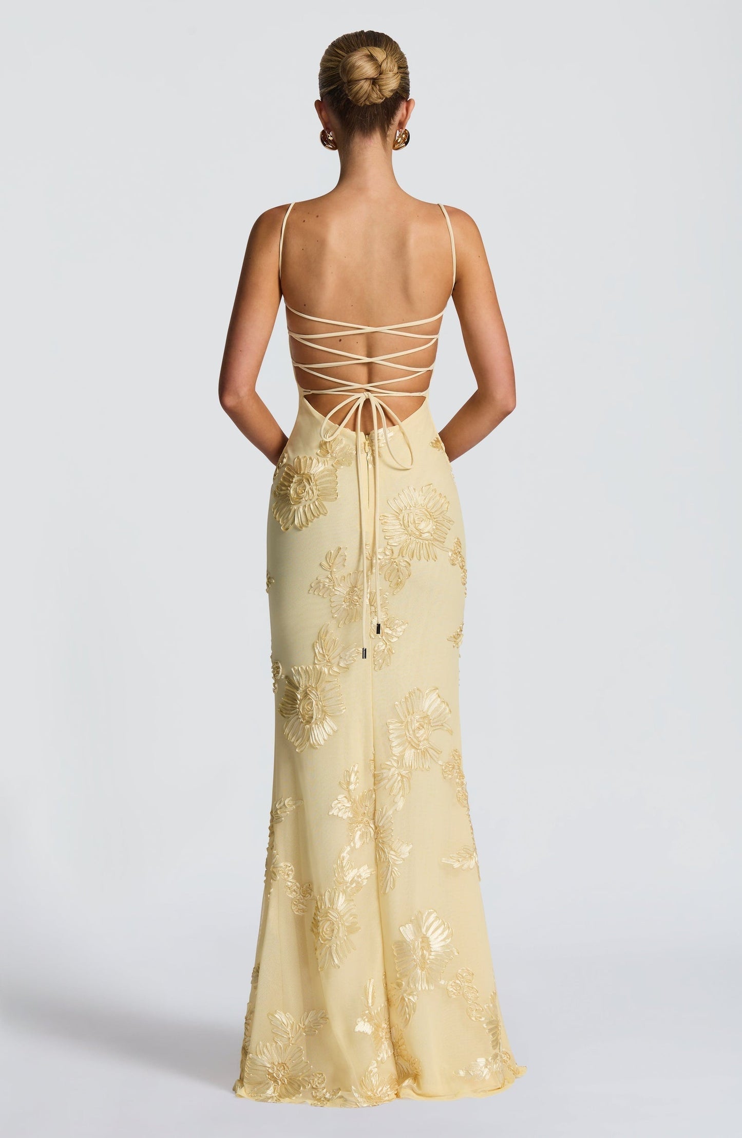 Corset dress shown from the side at full length
