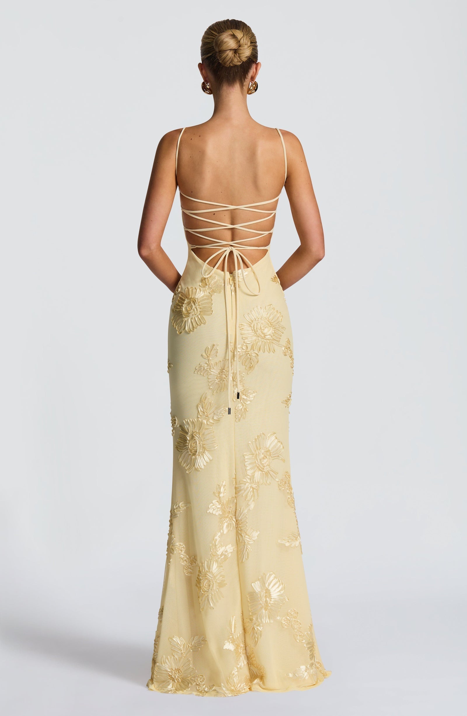 Corset dress shown from the side at full length