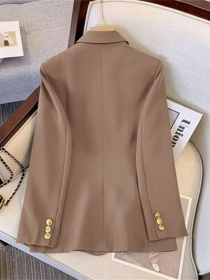 Double-breasted blazer showing the flap pockets and buttoned cuffs