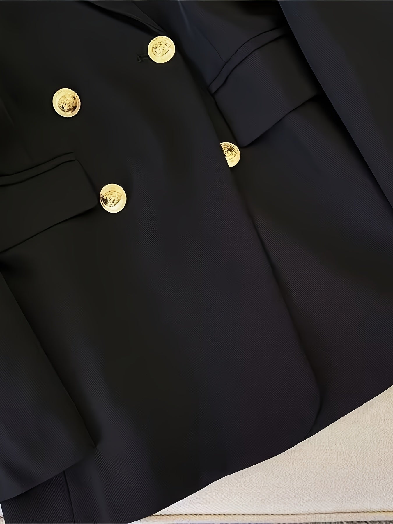 Notch-lapel blazer photographed at an angle