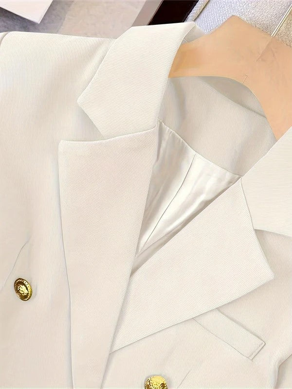 Close view of the buttoned cuff on a tailored blazer